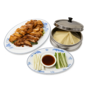 Canard laqué avec crêpes